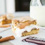 Snickerdoodles and S'mores collide in these sweet, cinnamony, and outrageously addictive cookie bars!