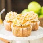 Fluffy apple-spiced cupcakes topped with a smooth and silky caramel swiss meringue buttercream!