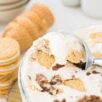 Unbelievably fluffy and creamy no-churn vanilla ice cream brimming with Cinnamon Roll Oreos, cinnamon chips, and sweet clusters of cinnamon roll filling!