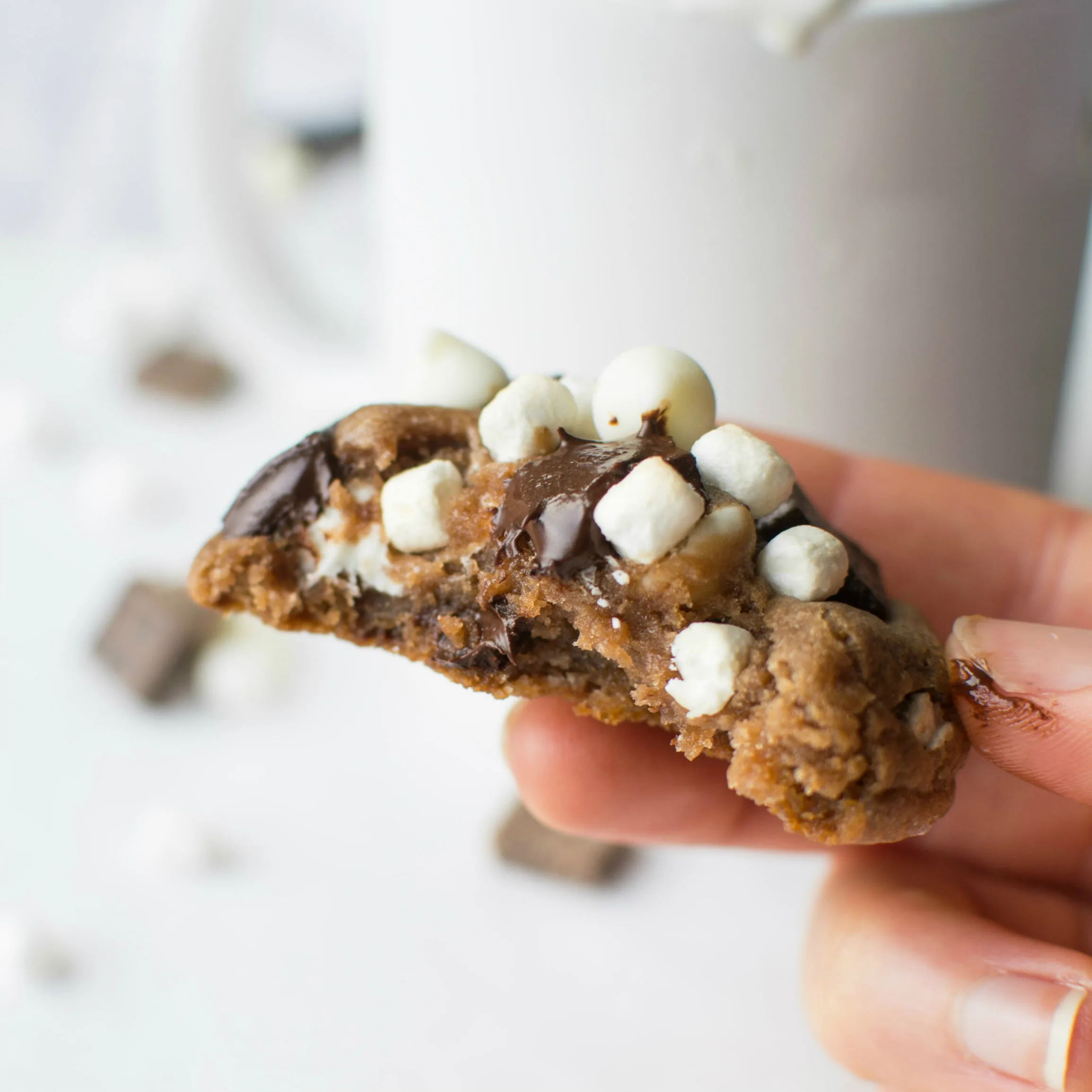 Soft and chewy Hot Chocolate cookies loaded with white chocolate chips, dark chocolate chunks, and mini marshmallow bits!