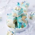 A super easy, soft and creamy white chocolate fudge that's guaranteed to satisfy your raw cookie dough eating obsession!