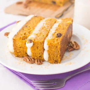 Incredibly moist and flavorful carrot cake frosted with a thick and rich cream cheese frosting! My favorite carrot cake recipe to date!