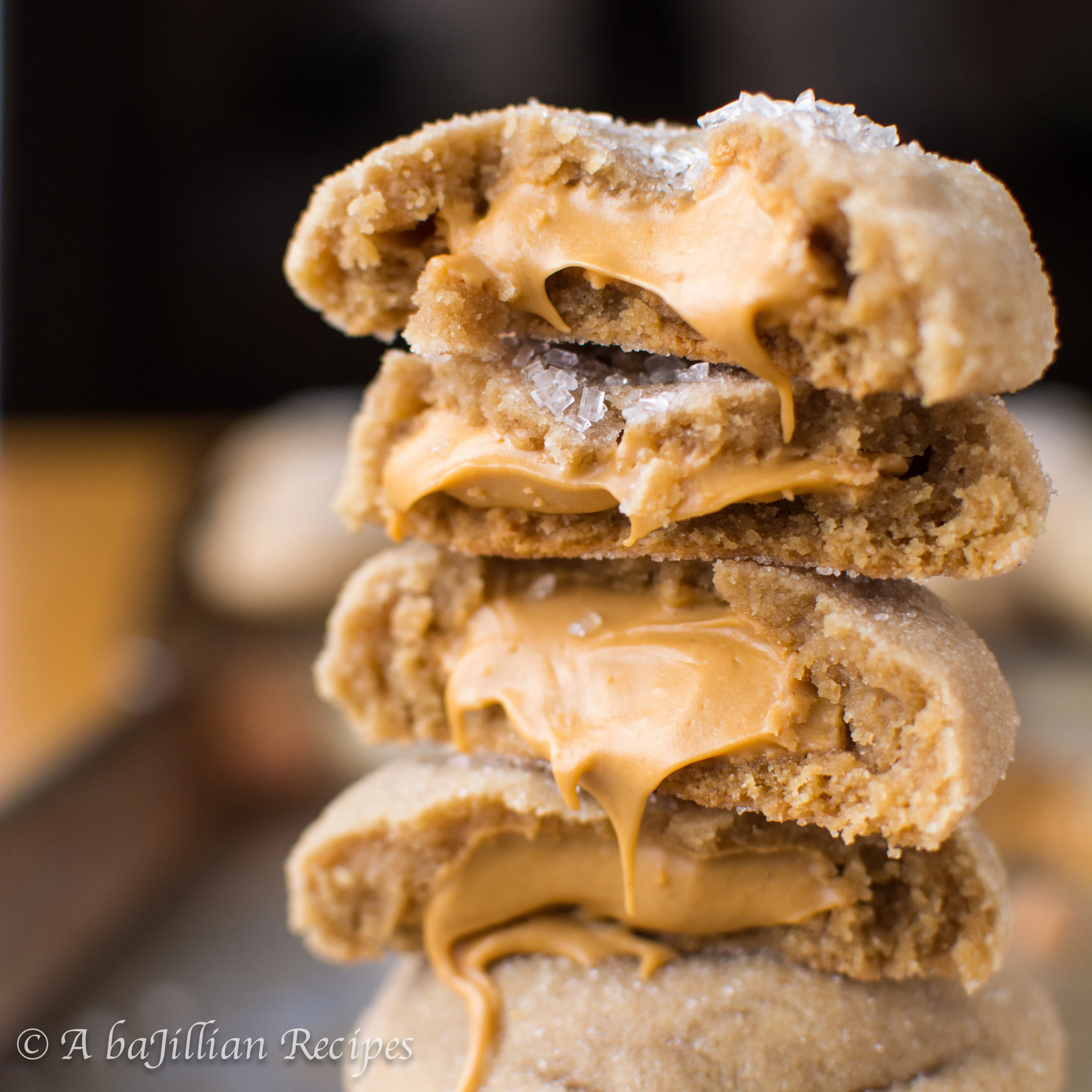 Super soft and chewy peanut buttery cookies stuffed with a peanut butter butterscotch truffle filling!