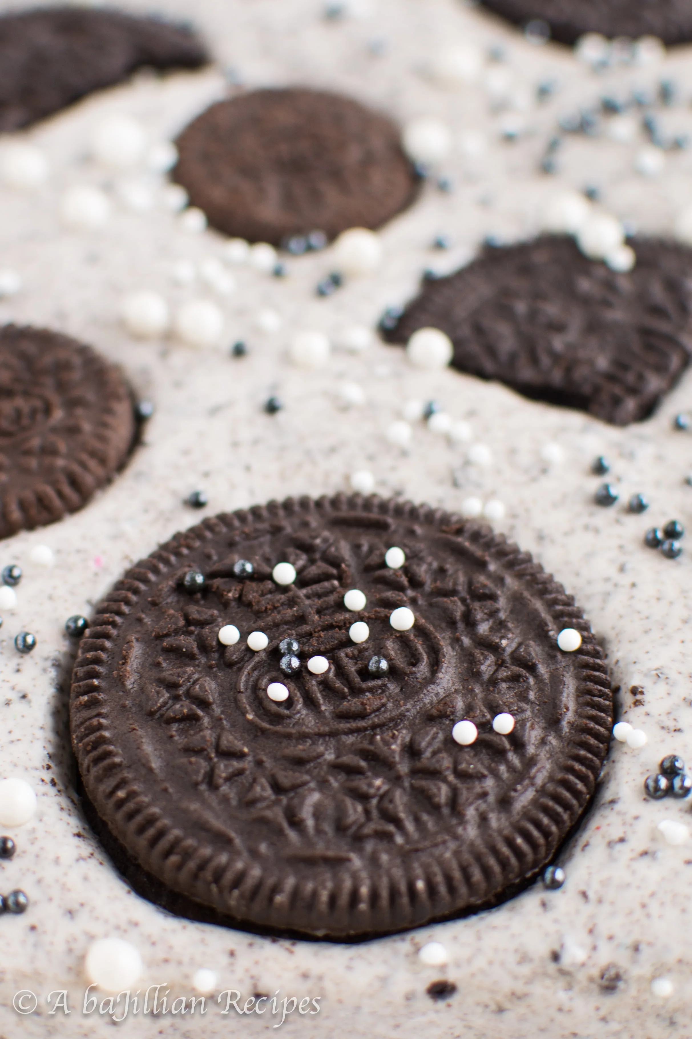 Thick and fudgy brownies, Oreo truffle filling, and fluffy Oreo frosting! THREE layers of Oreo deliciousness in one bite!