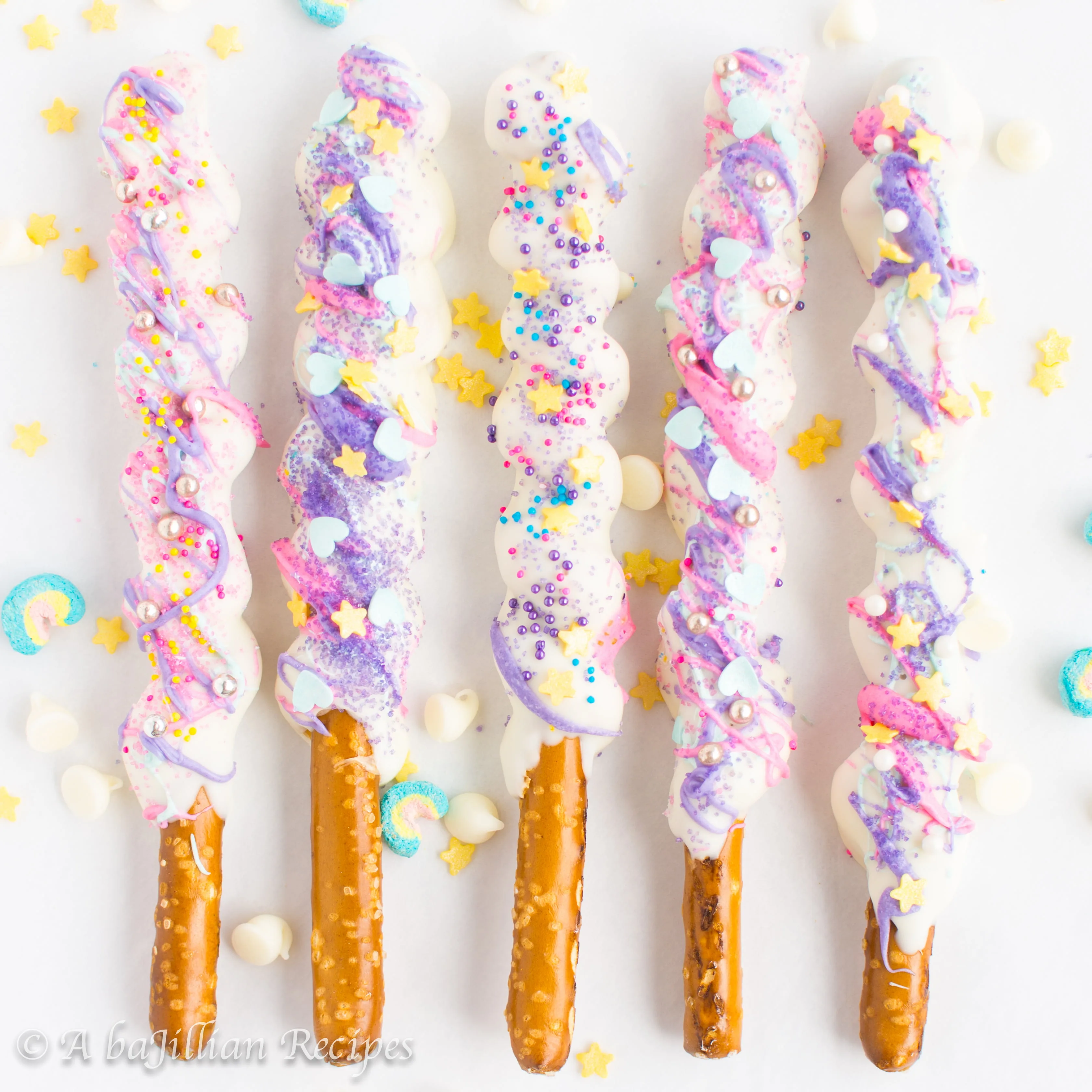 Crunchy pretzel sticks wrapped in caramel, coated in white chocolate, and showered in sprinkles! Just 5 easy ingredients!