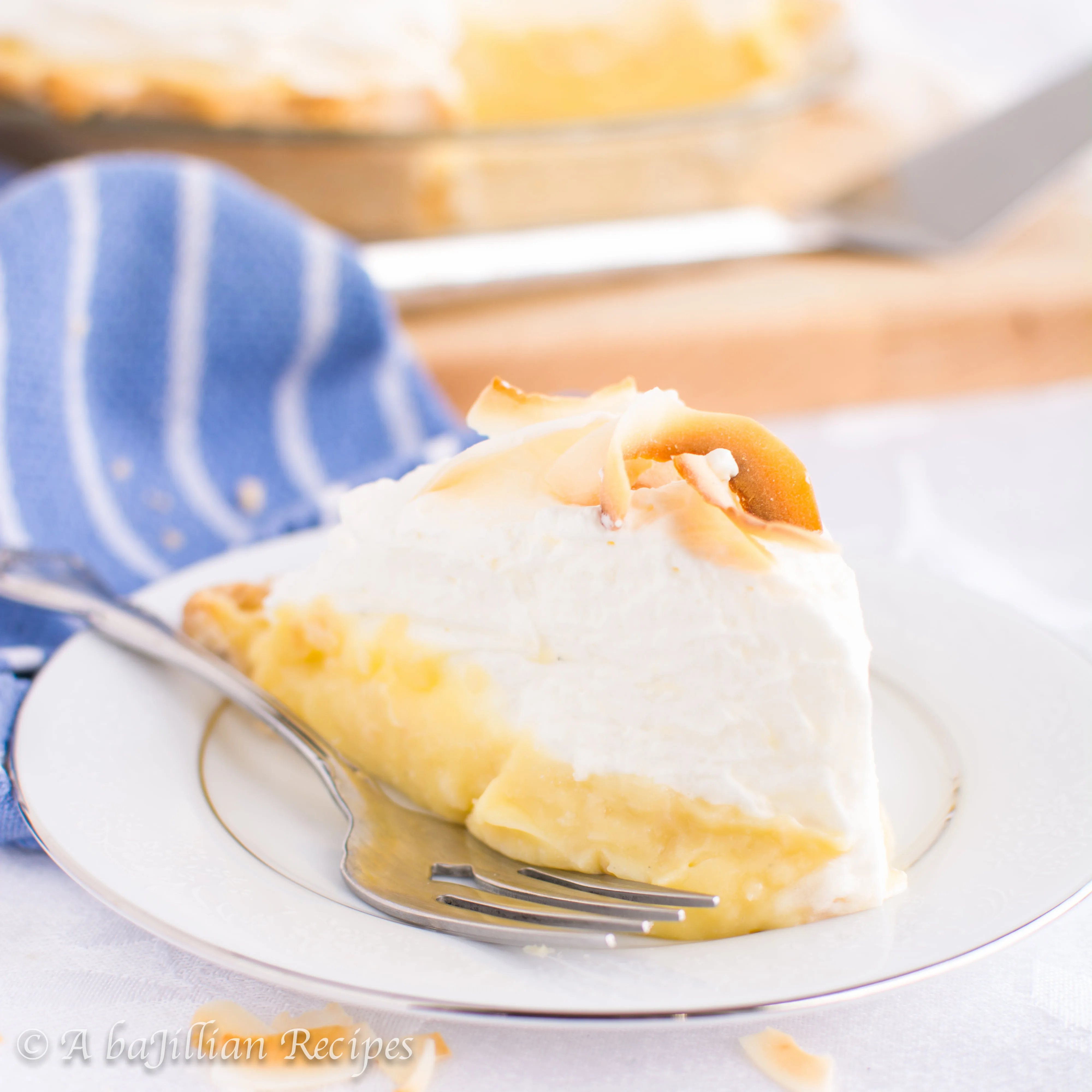 Toasted coconut filling with the added richness of white chocolate, topped with a mountain of freshly whipped cream! This White Chocolate Coconut Cream Pie is smooth, decadent, lusciously creamy!