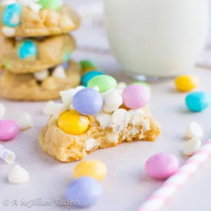 These forever soft and chewy cookies are loaded with a triple dose of white chocolate--white chocolate M&M's, white chocolate chips, and white chocolate pudding!