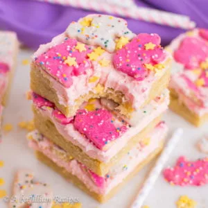 Soft and chewy cookie bars frosted with a thick layer of fluffy buttercream and topped with those irresistible Circus Animal cookies!