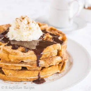 Cinnamon sugar-coated waffles drizzled in a sweet and spicy Mexican chocolate sauce!