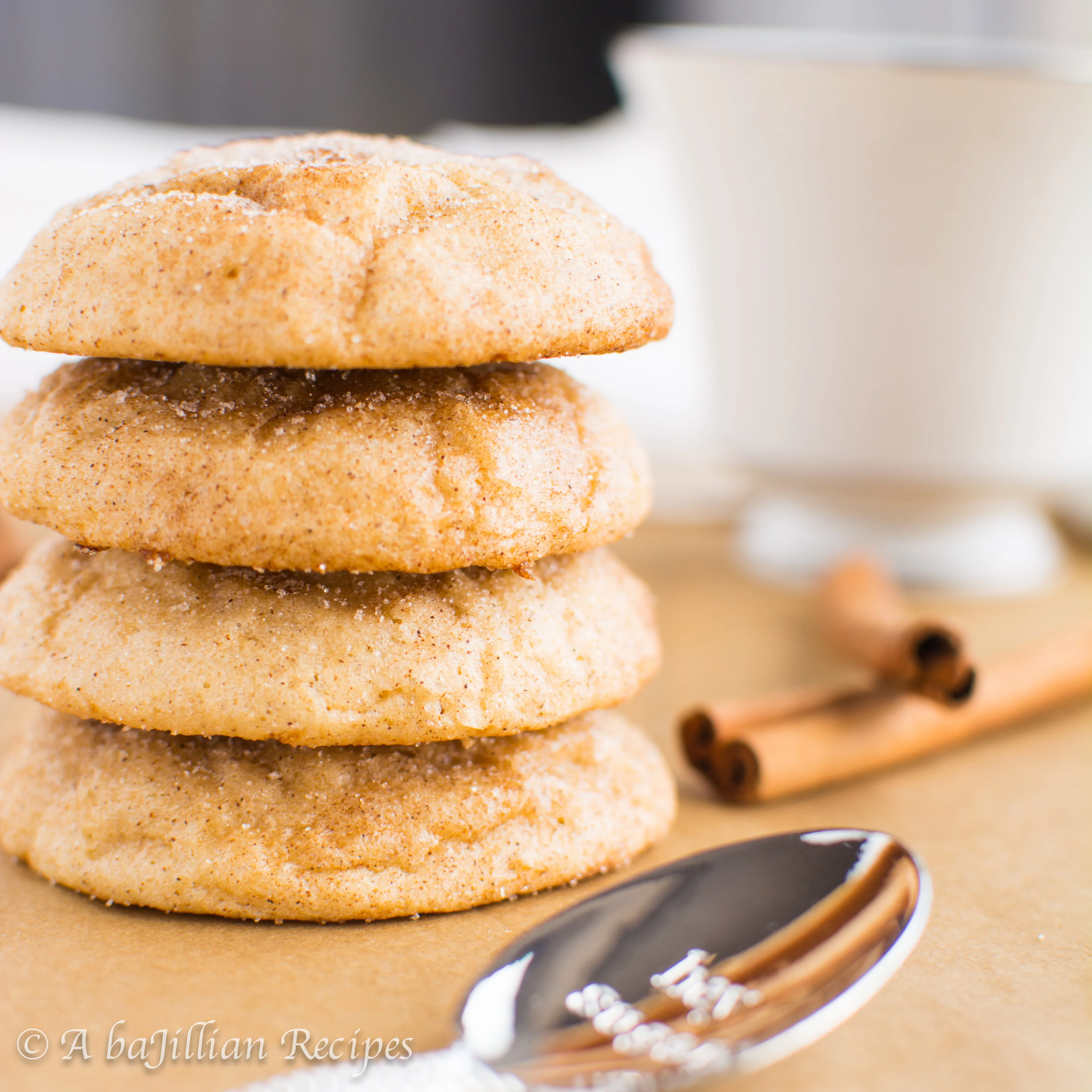 Ultra soft, thick, and delightfully chewy Snickerdoodles infused with the tart sweetness of hot apple cider!