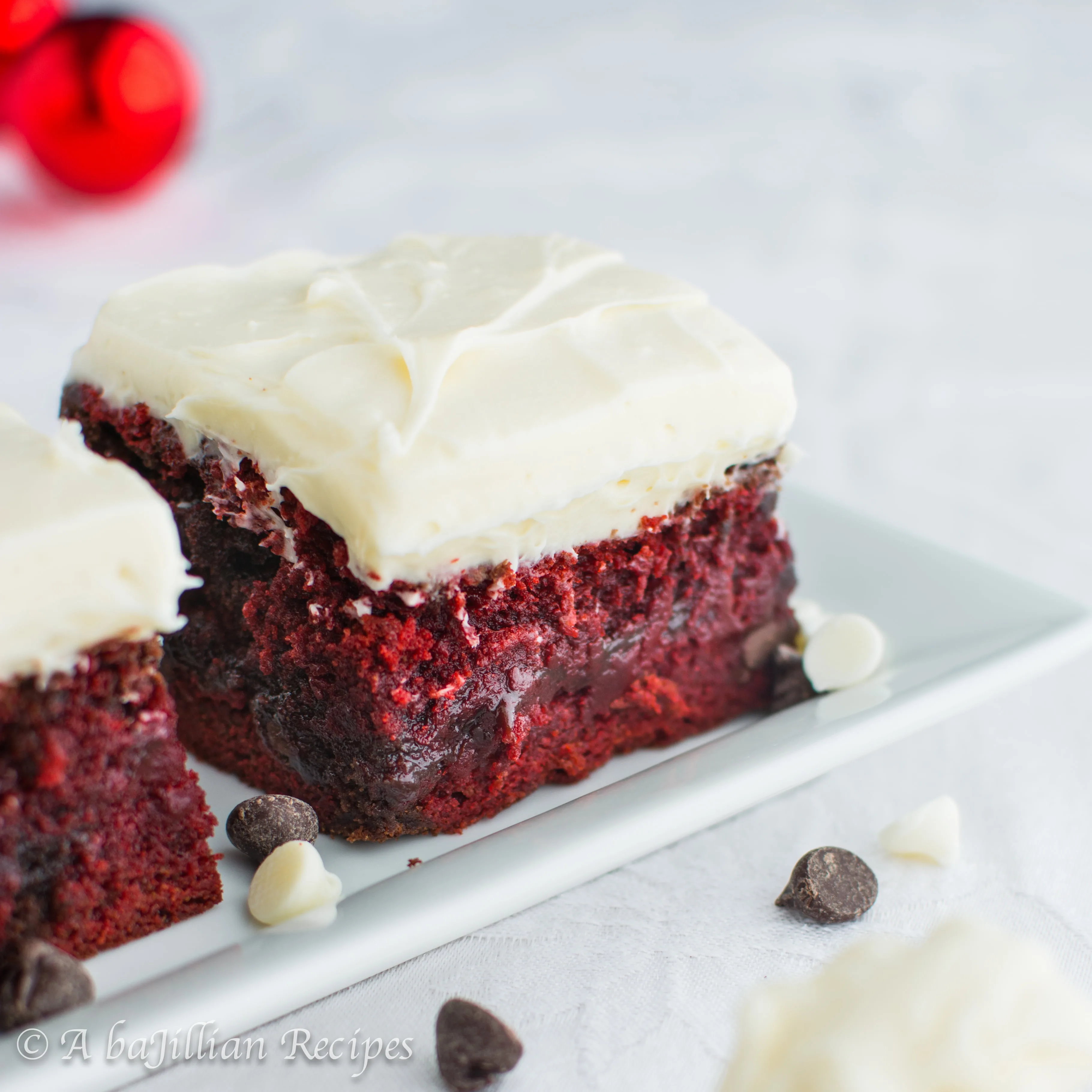 The fudgiest brownies swirled with red velvet and topped with the richest, creamiest white chocolate cream cheese frosting!
