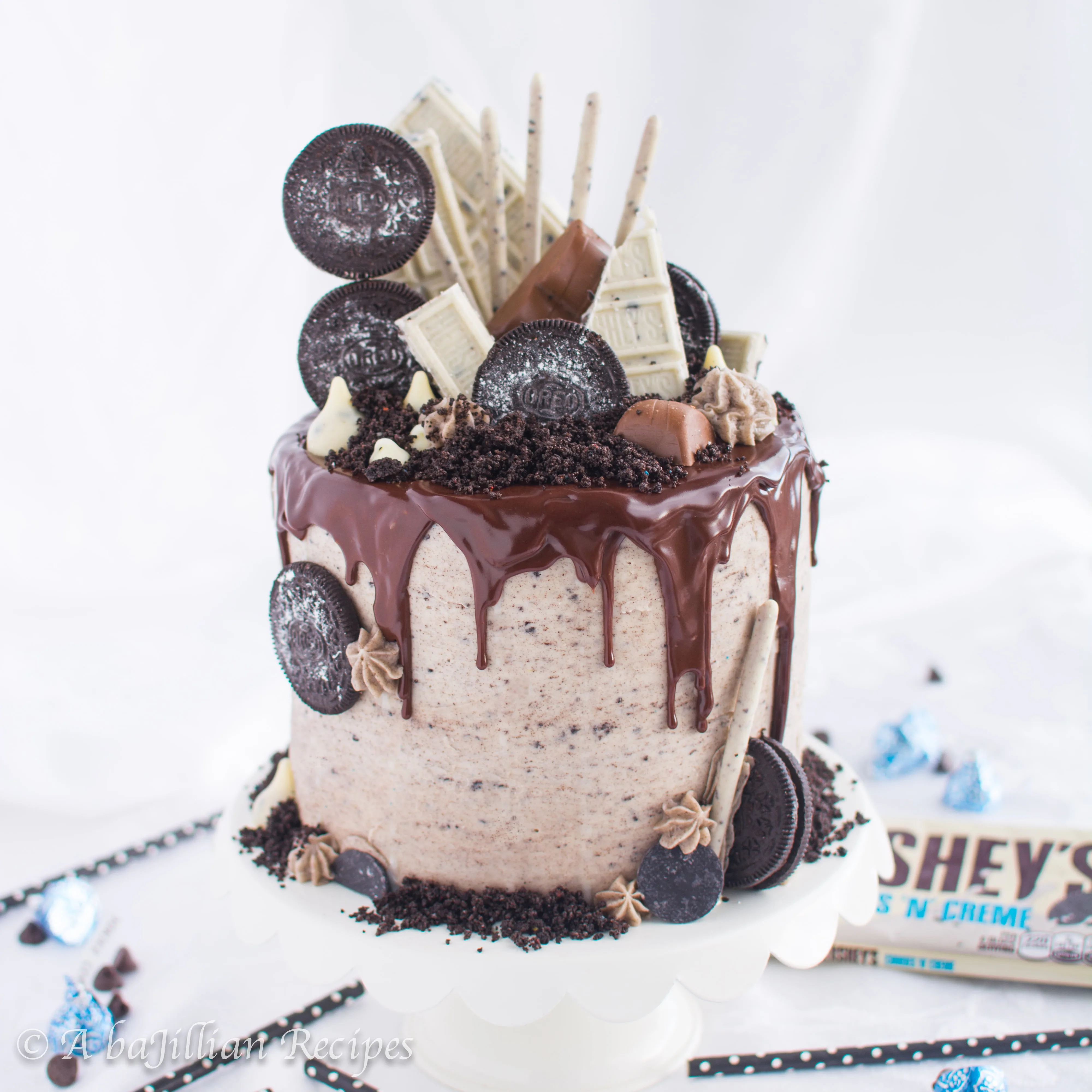 Moist layers of Oreo-infused chocolate cake filled with fluffy cookies n' creme mousse and frosted in creamy Oreo buttercream! Triple the Oreo, triple the deliciousness!
