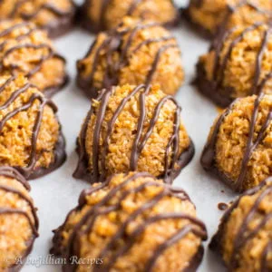 Rich caramel and sweet coconut come together in this soft and chewy cookie dipped in rich chocolate!