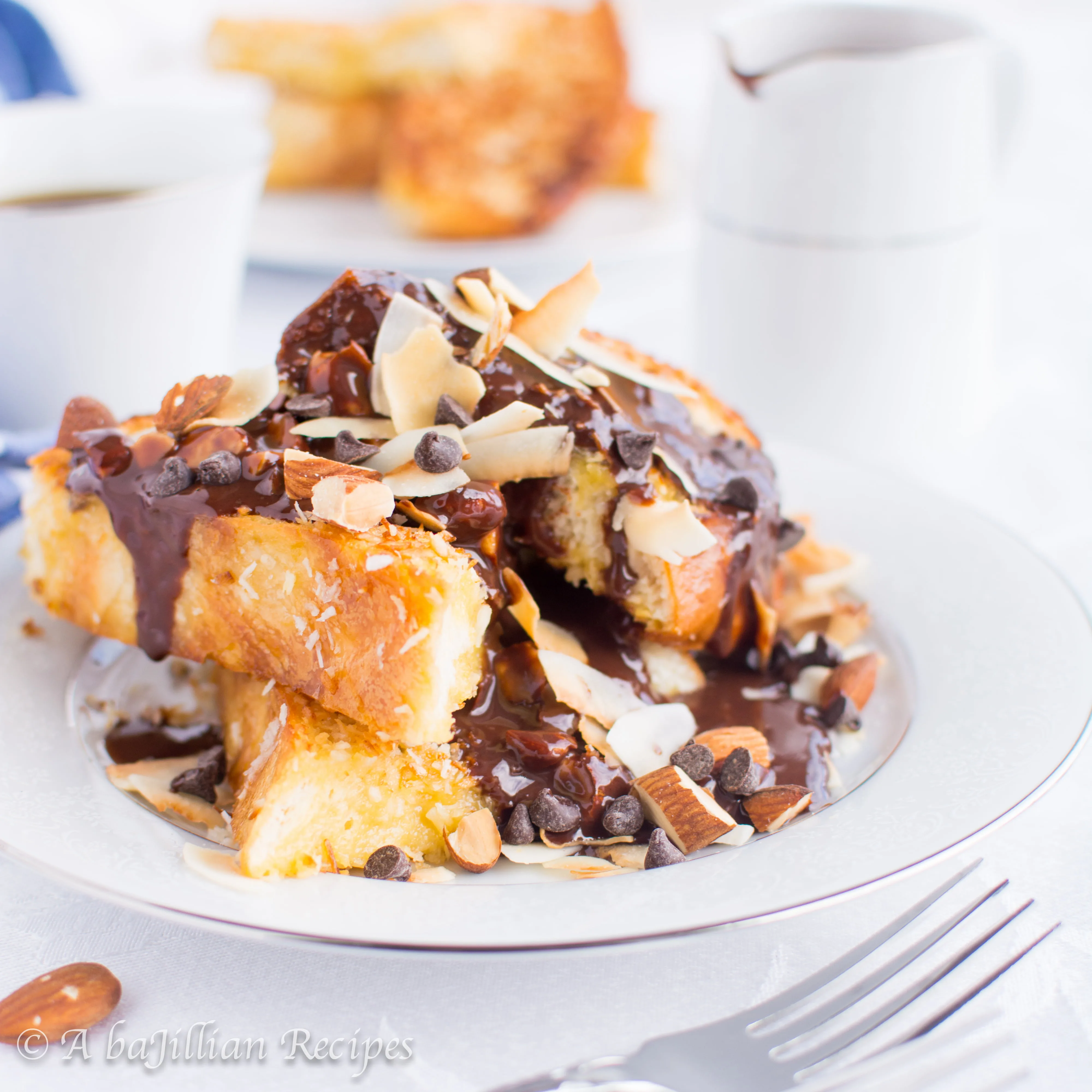 Crispy coconut-coated french toast generously drizzled in luxuriously rich chocolate-covered almond sauce!