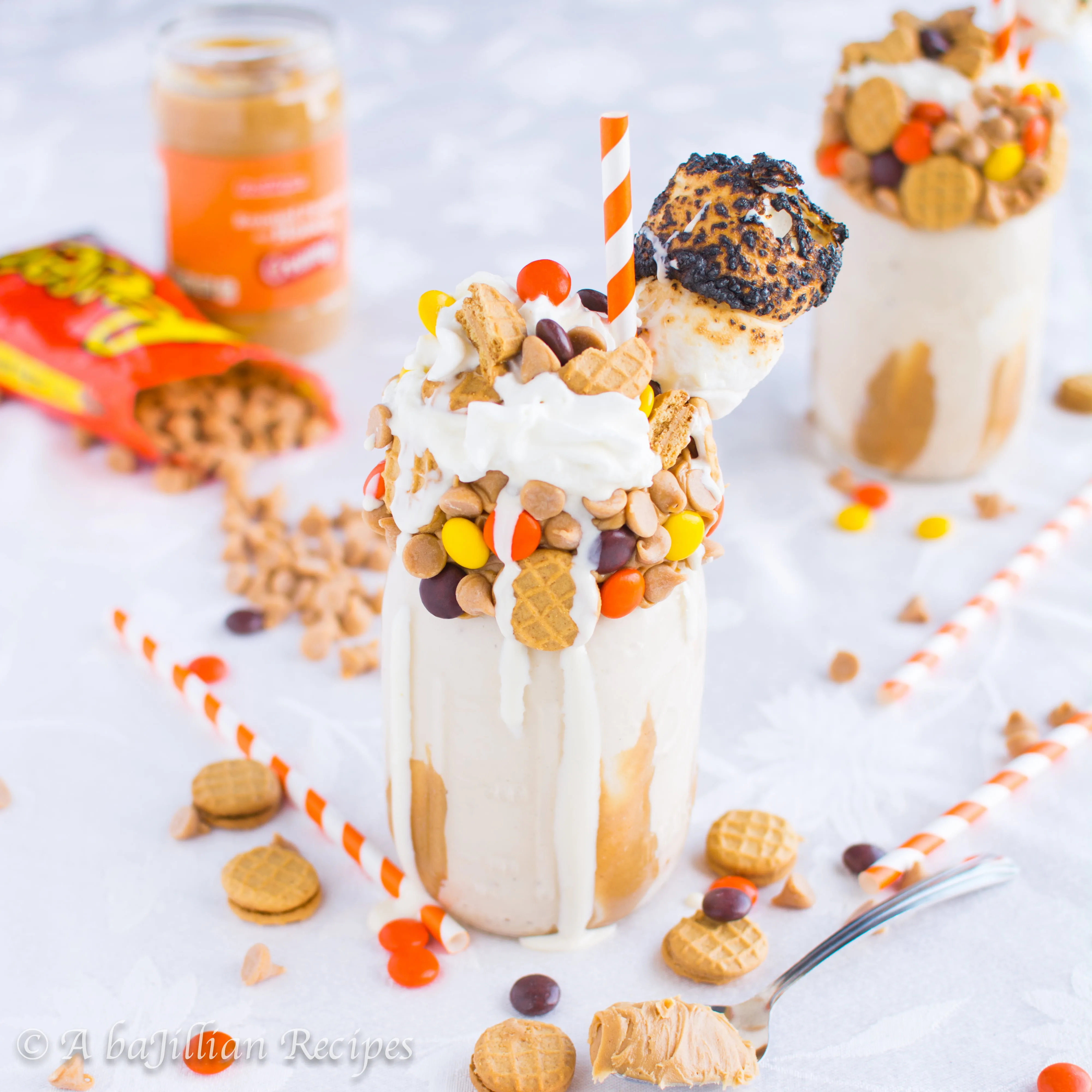 A cool and creamy milkshake flavored with peanut butter and toasted marshmallows, then loaded up with Reese's Pieces, Nutter Butter Cookies, Peanut Butter Chips, whipped cream, and toasted marshmallows!