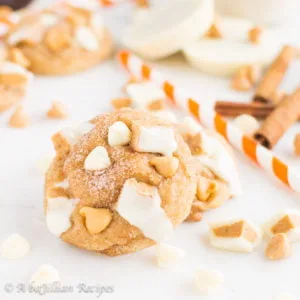 The softest snickerdoodles stuffed with white chocolate chips, peanut butter chips, and White Chocolate Reeses Peanut Butter Cups!