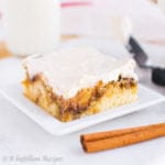 Soft and fluffy cake swirled with brown sugar, butter, and cinnamon, topped with rich cream cheese icing! This cake has everything you love about the classic cinnamon roll, and it's ten times easier to make!