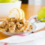 Tender apples slow-cooked in salted caramel and topped with a buttery, brown sugary oatmeal topping!
