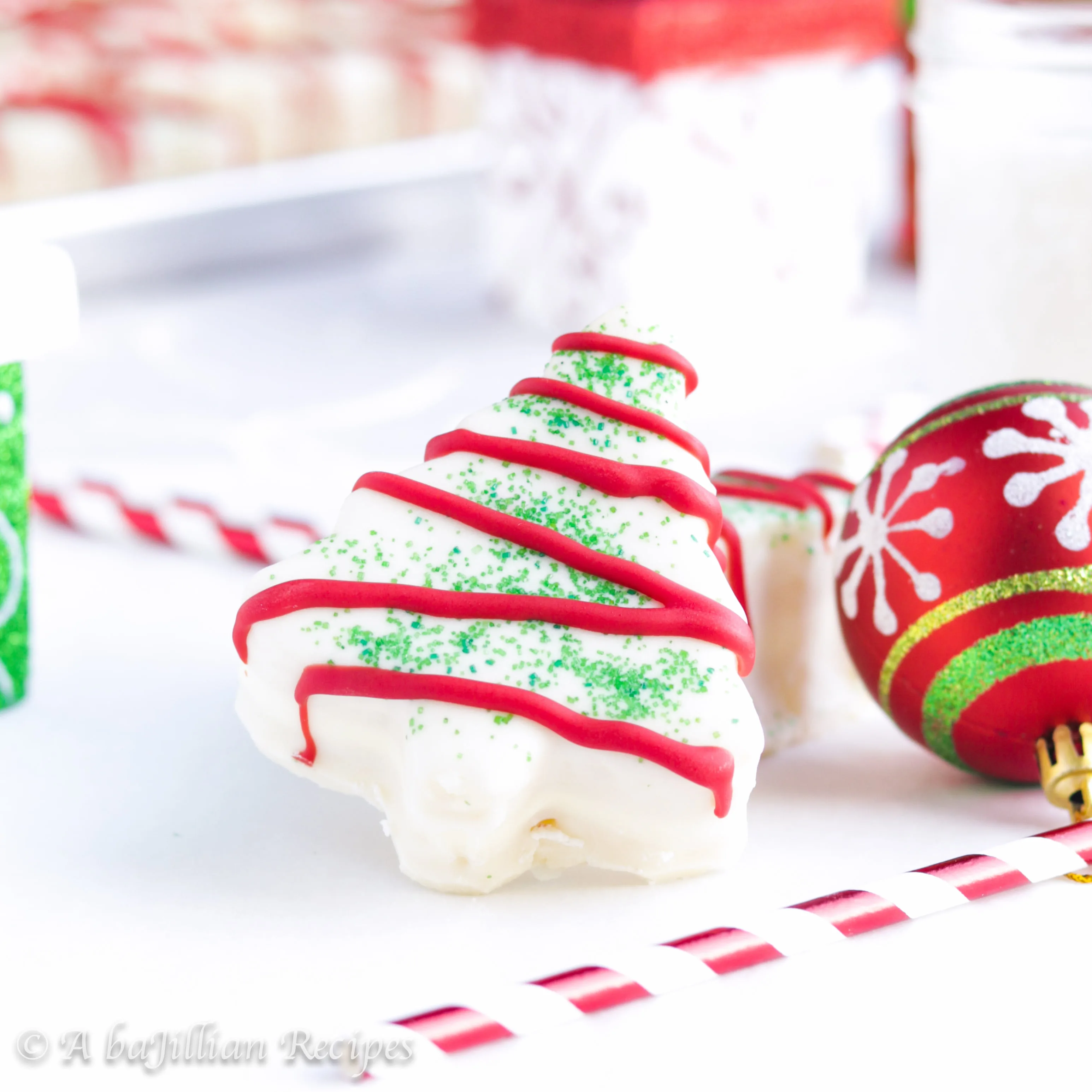 Soft golden cake layers filled with a fluffy marshmallow buttercream and dipped in rich white chocolate! A Little Debbie holiday favorite made from scratch!
