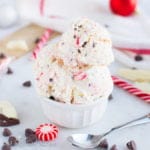 This easy no-churn Peppermint Bark Ice Cream is blended with crushed candy canes and flecks of dark chocolate and white chocolate!
