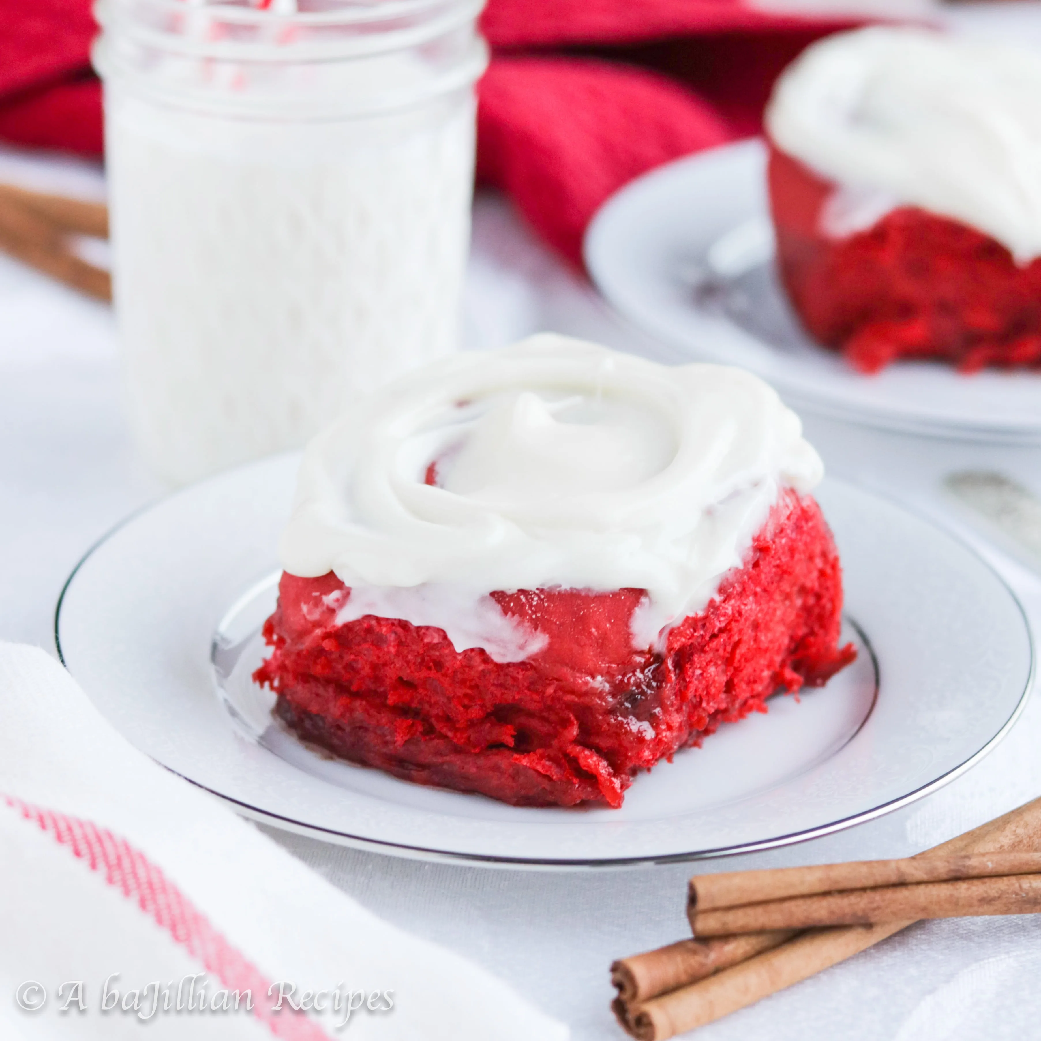 Vibrantly red and supremely fluffy Red Velvet Cinnamon Rolls complete with the always addictive gooey brown sugar-cinnamon swirl and of course, the rich cream cheese frosting!