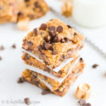Soft and chewy oatmeal cookie bars loaded with ooey, gooey Rolo caramels!