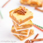 Deliciously dense and chewy carrot cake blondies with a rich and tangy cheesecake swirl!