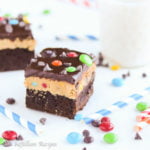 Fudgy brownies topped with peanut buttery monster cookie dough and rich chocolate ganache!