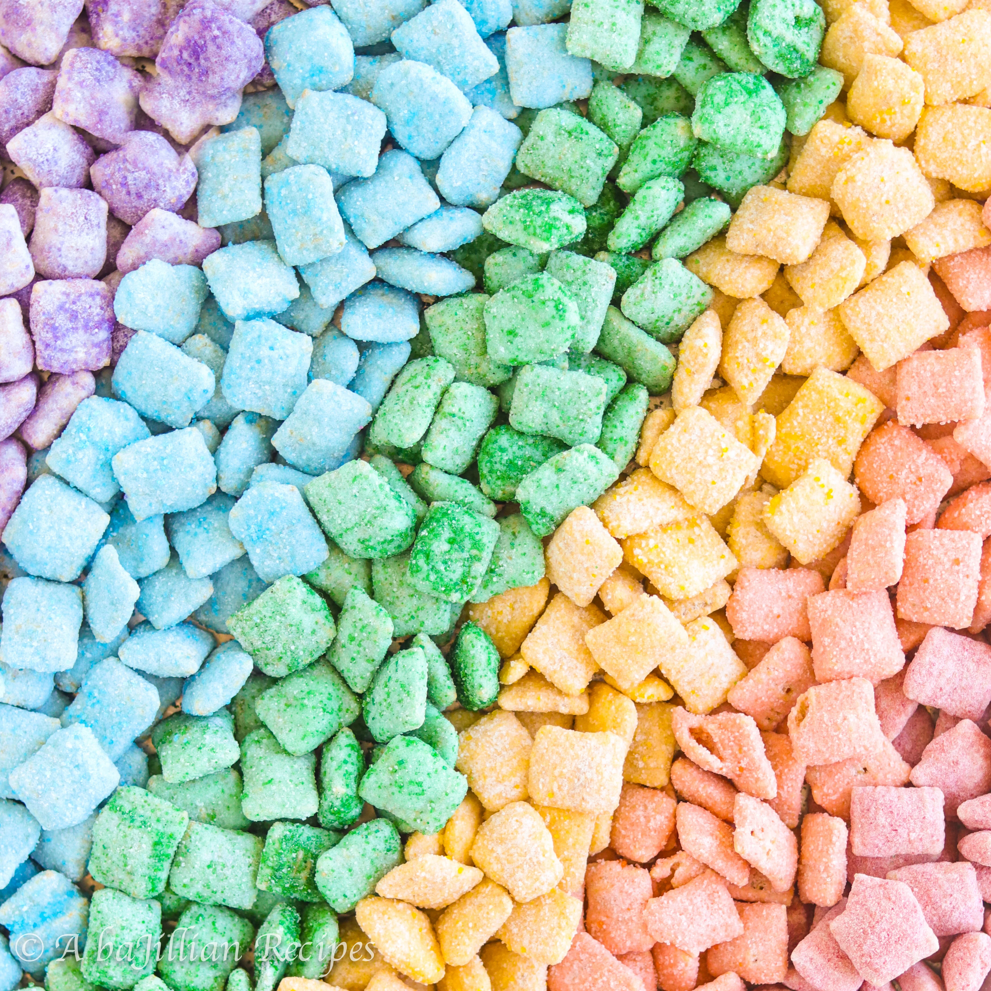 This colorful Puppy Chow is wrapped in rich white chocolate, coated in every color of the rainbow, and flavored with strawberry, orange, lemon, lime, blue raspberry, and grape!