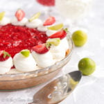 Rich and deliciously tangy key lime filling, fluffy cheesecake filling, and fresh strawberry topping in a graham cracker crust!