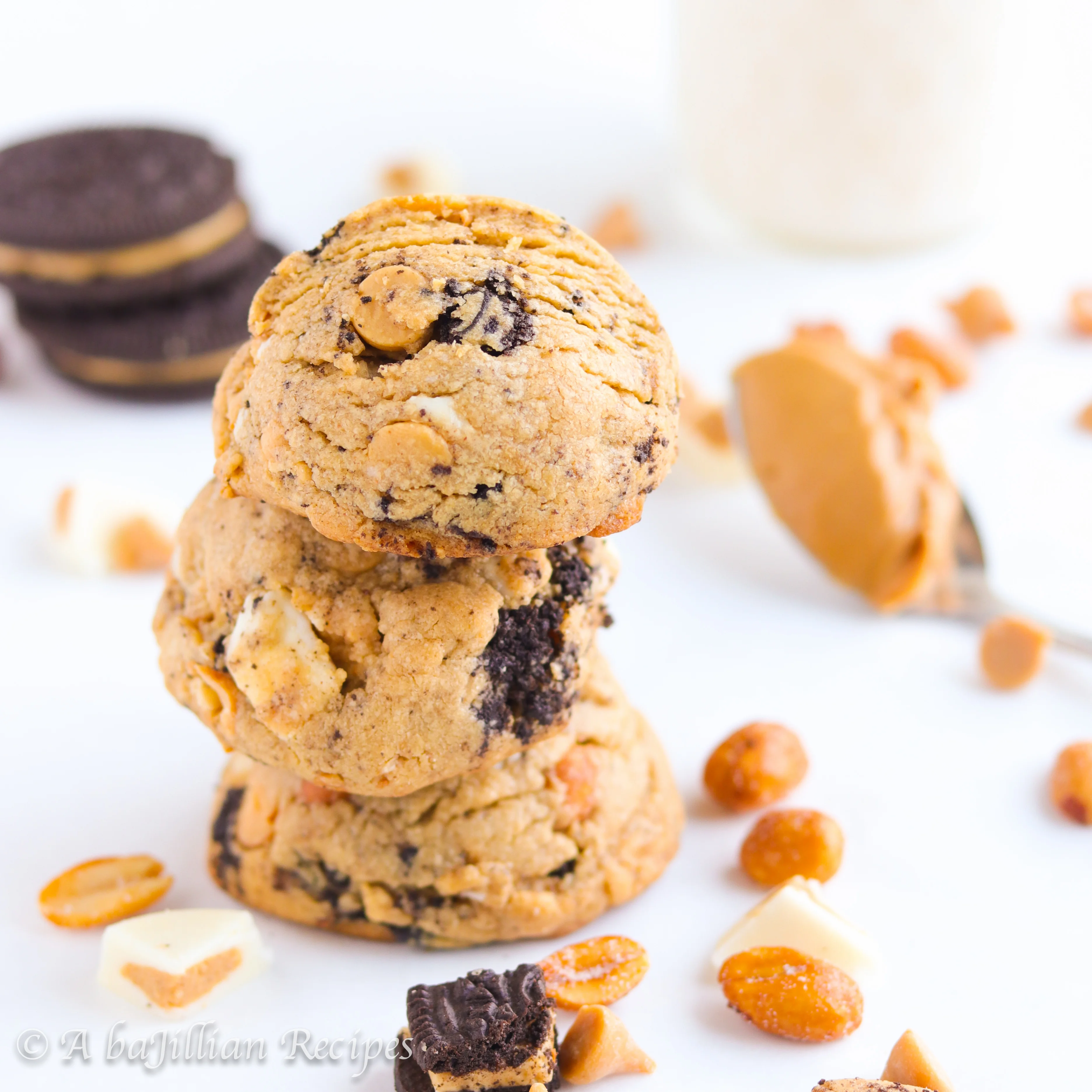 Super thick and chunky peanut butter cookies brimming with peanut butter chips, honey roasted peanuts, Reese's peanut butter cups, and peanut butter Oreos!