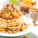 Fluffy flapjacks with a sweet cinnamon-spiced pear topping and a generous dose of buttery oat streusel!