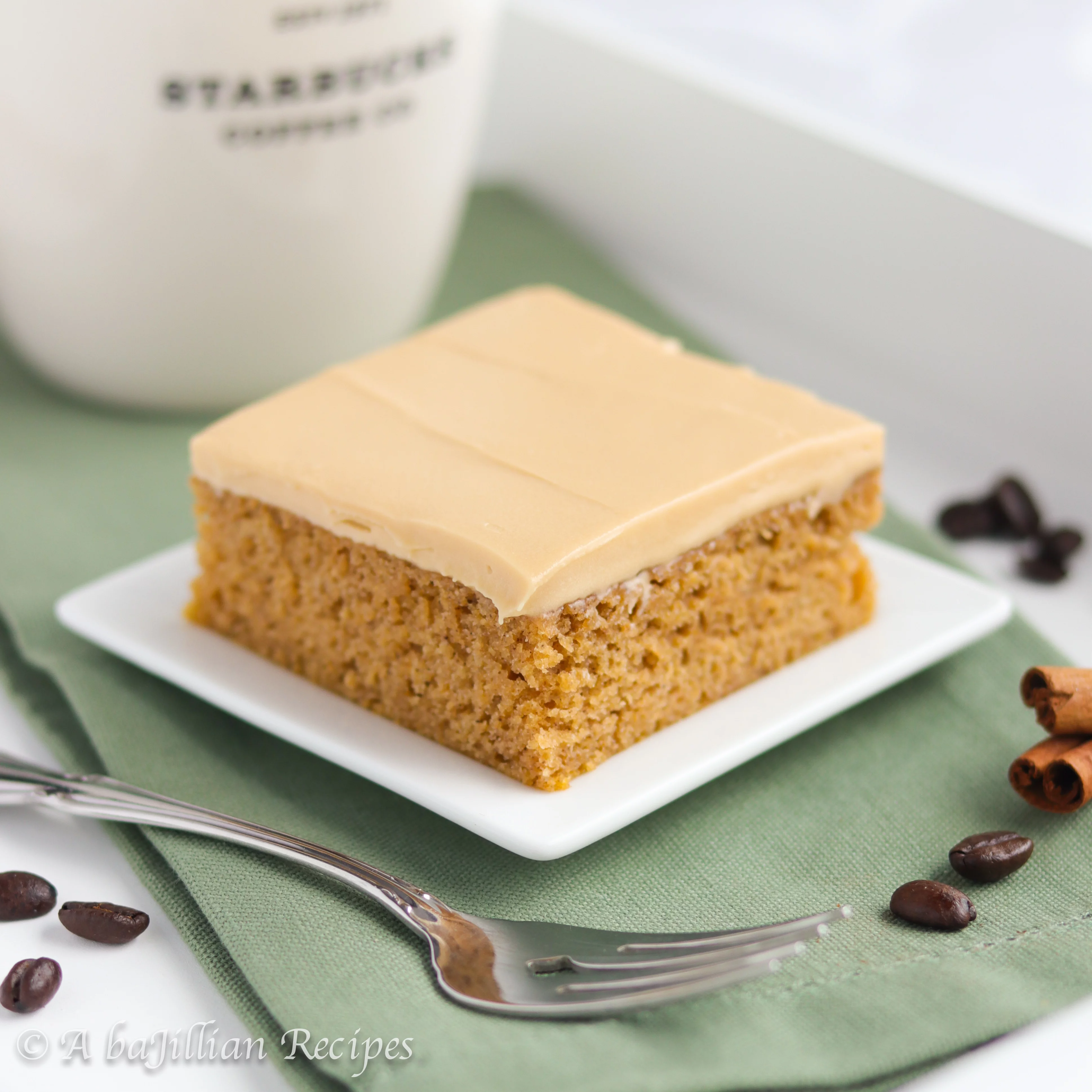 Soft and supremely moist pumpkin cake bars topped with a delicious latte cream cheese frosting!