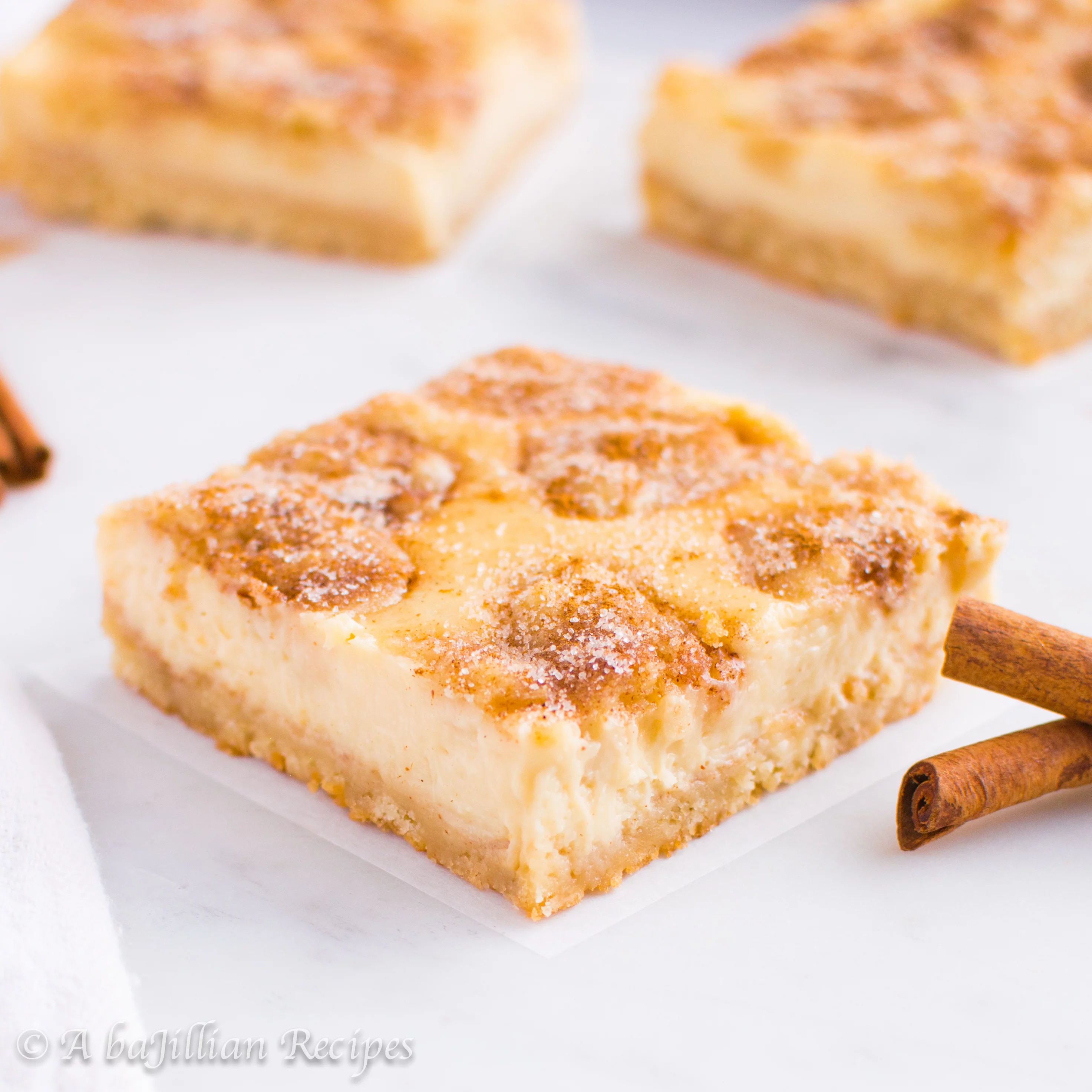 Soft, cinnamon-sugary snickerdoodles and deliciously creamy cheesecake collide in these heavenly bars!