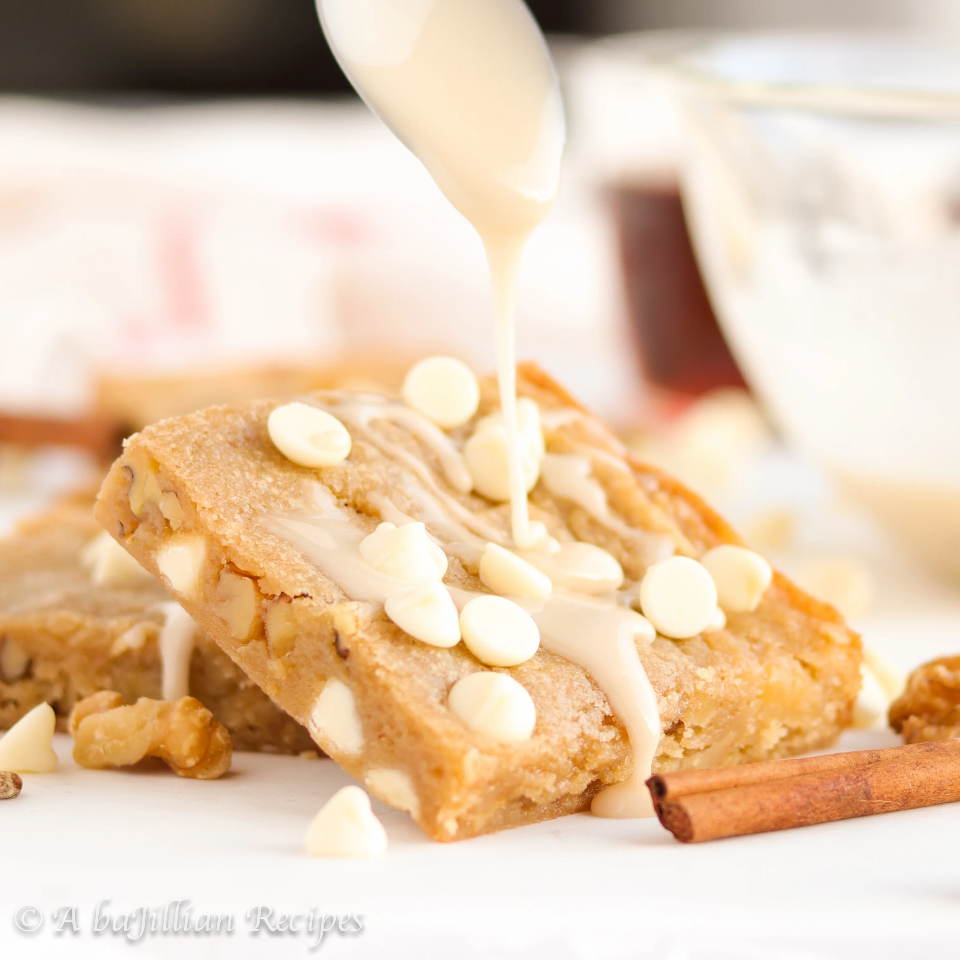 Soft and buttery blondies loaded with cinnamon-spiced apples, white chocolate chips and walnuts, and drizzled in the most glorious apple cider glaze!
