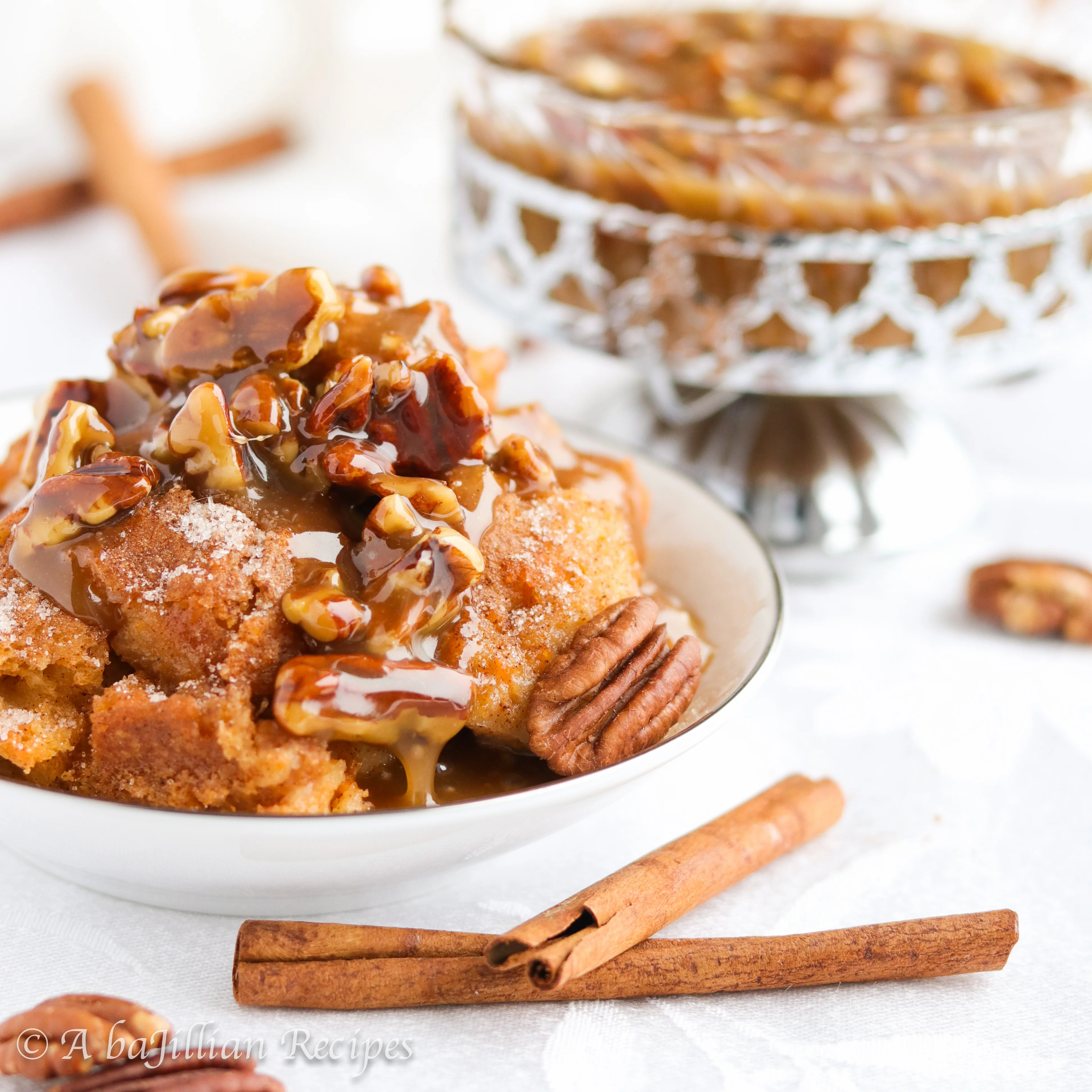 Classic bread pudding amplified with the addition of creamy sweet potatoes, fall spices, and the most heavenly pecan praline sauce!
