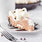 The fluffiest hot chocolate cream filling, pockets of marshmallow fluff, and loads of whipped cream in a chocolate cookie crumb crust!
