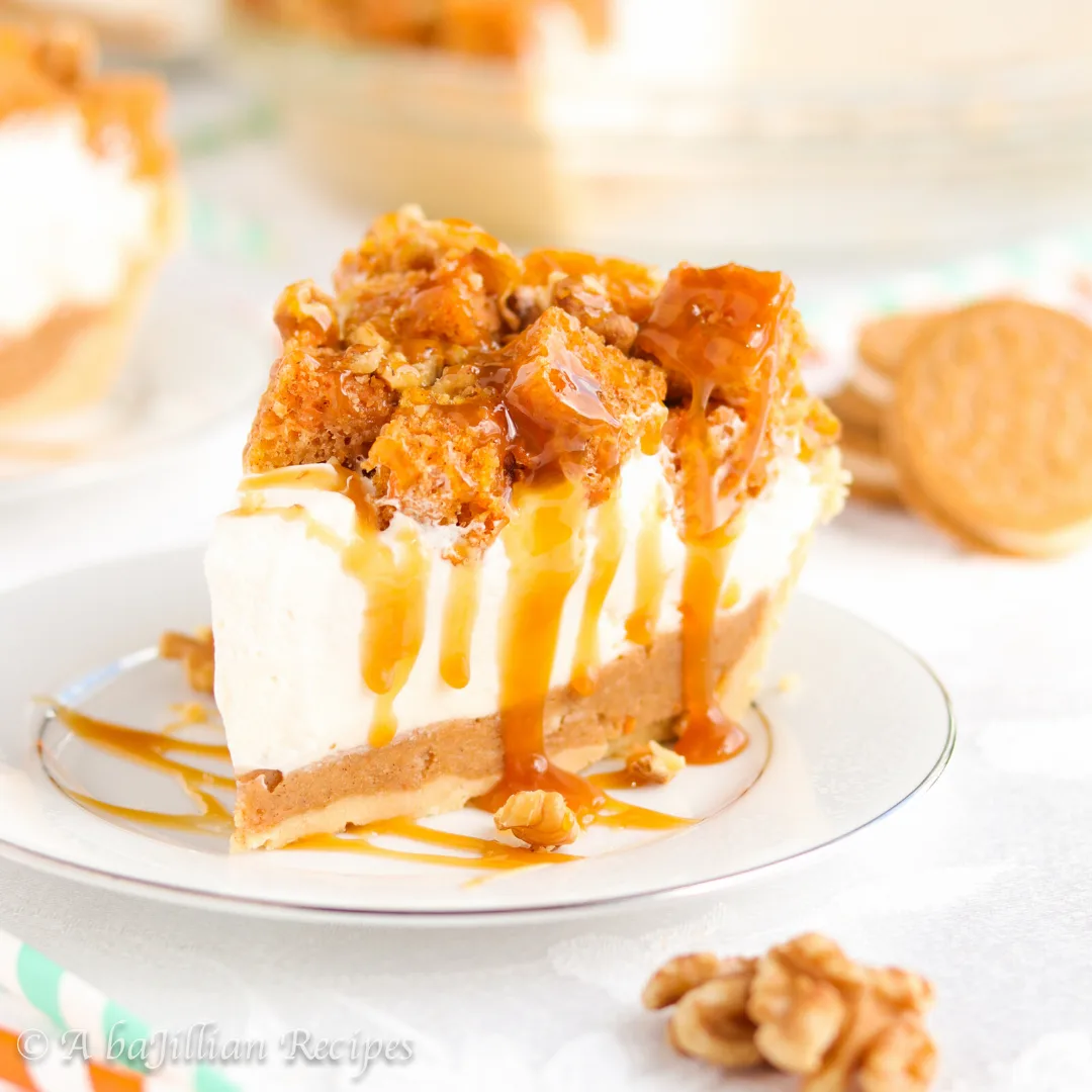 Layers of Carrot Cake Oreo truffle filling, sweetened cream cheese filling, whipped cream, and a border of delicious carrot cake all in a sweet Golden Oreo crust!