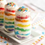 Multi-colored layers of sweet vanilla cake and creamy cake batter mousse!
