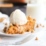 Warm, soft, and doughy butterscotch cookie loaded with peanut butter chips, butterscotch chips, and gooey pockets of peanut butter-butterscotch filling!
