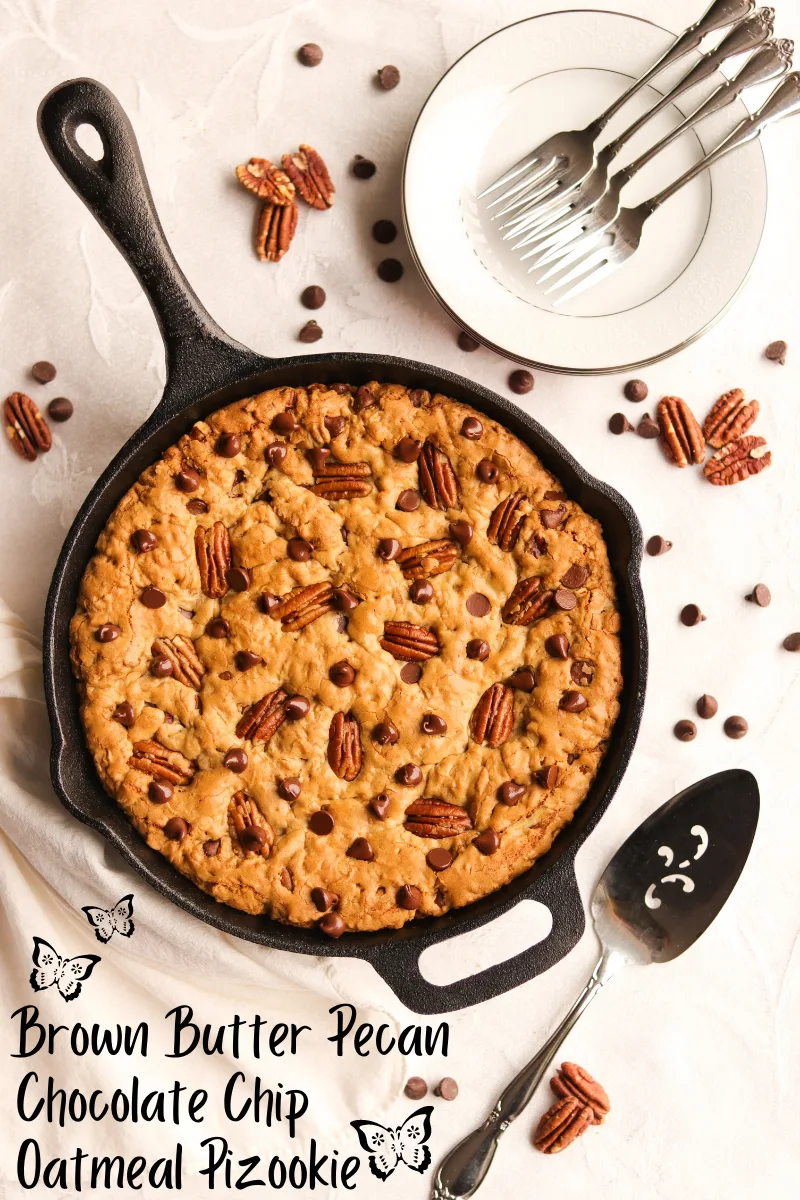 A warm and doughy deep-dish oatmeal cookie brimming with buttered pecans, chocolate chips, and chewy oats!