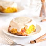 Soft and incredibly doughy pumpkin cinnamon rolls topped with rich and velvety maple cream cheese icing!