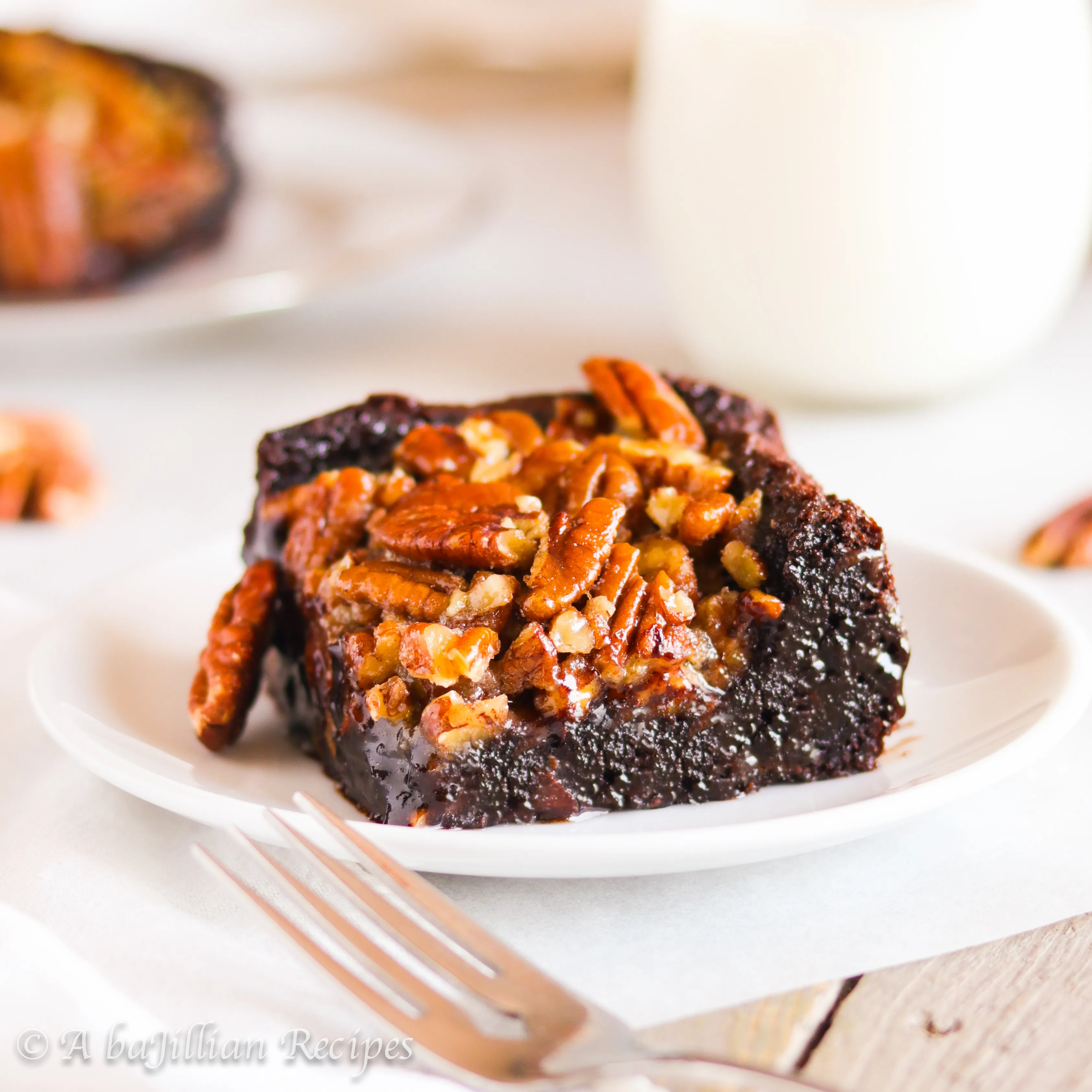 Dense and fudgy brownies topped with a sweet and sinful pecan pie topping!