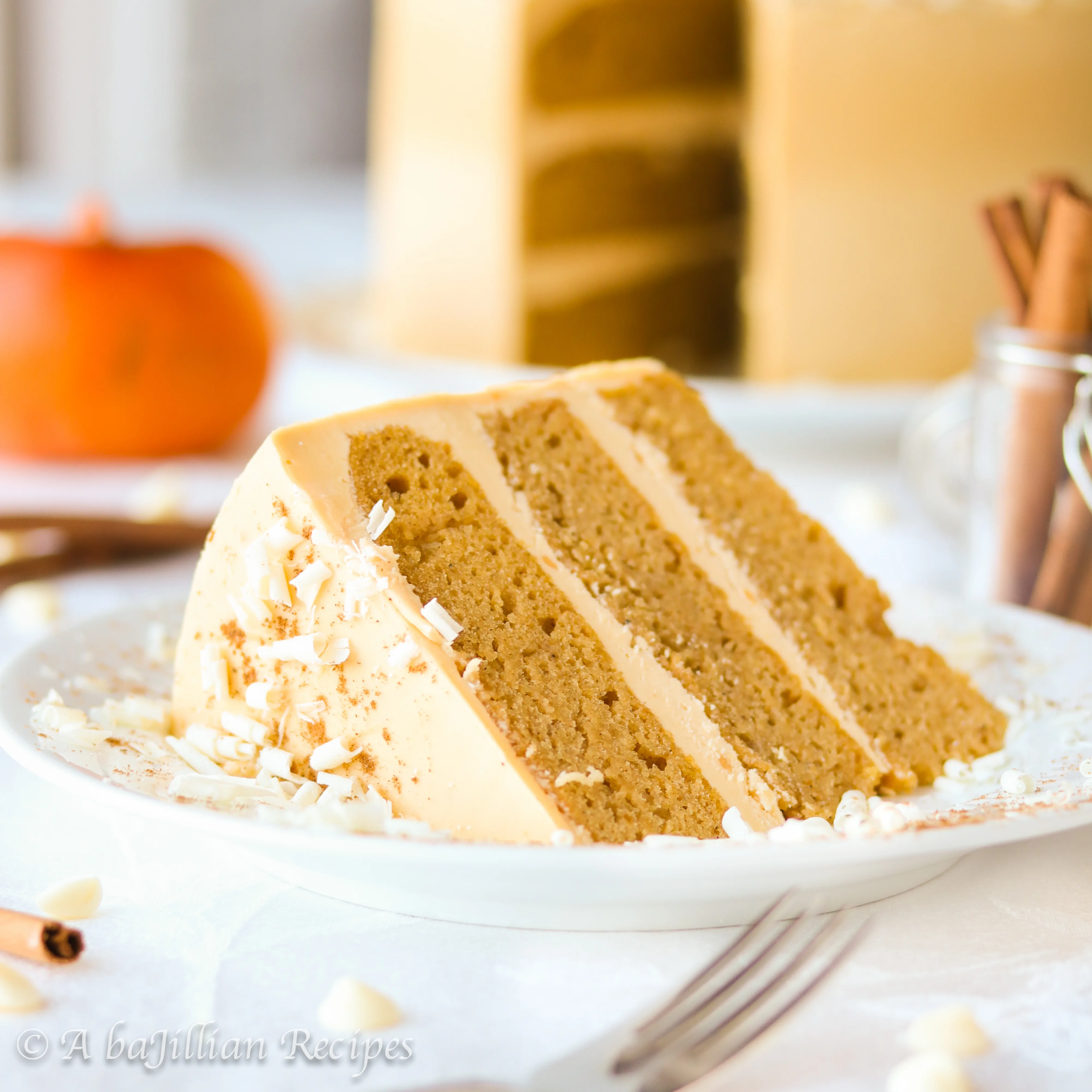 Supremely fluffy and perfectly-spiced layers of pumpkin cake between the most delicious caramelized white chocolate buttercream ever!
