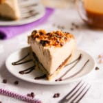 Fluffy salted caramel cream filling and rich chocolate ganache in a delicious shortbread cookie crust and topped with the most heavenly coconut topping!