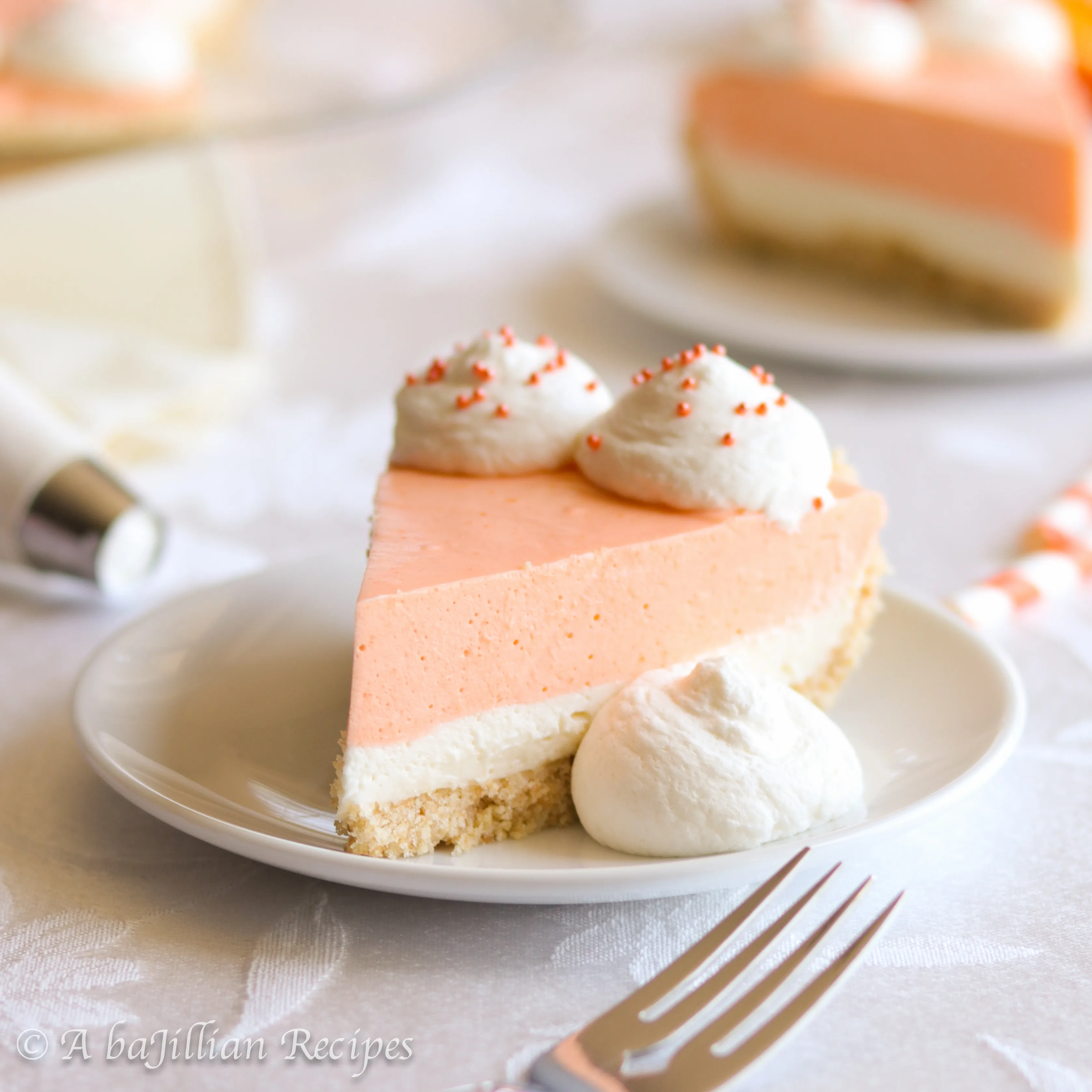 This Orange Creamsicle Pie consists of a sweet shortbread cookie crust, a layer of smooth no-bake vanilla cheesecake, and a layer of creamy orange filling!