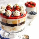 Layers of fluffy angel food cake, sweet blueberry AND strawberry toppings, and luscious white chocolate cream filling all in one beautifully patriotic dessert!