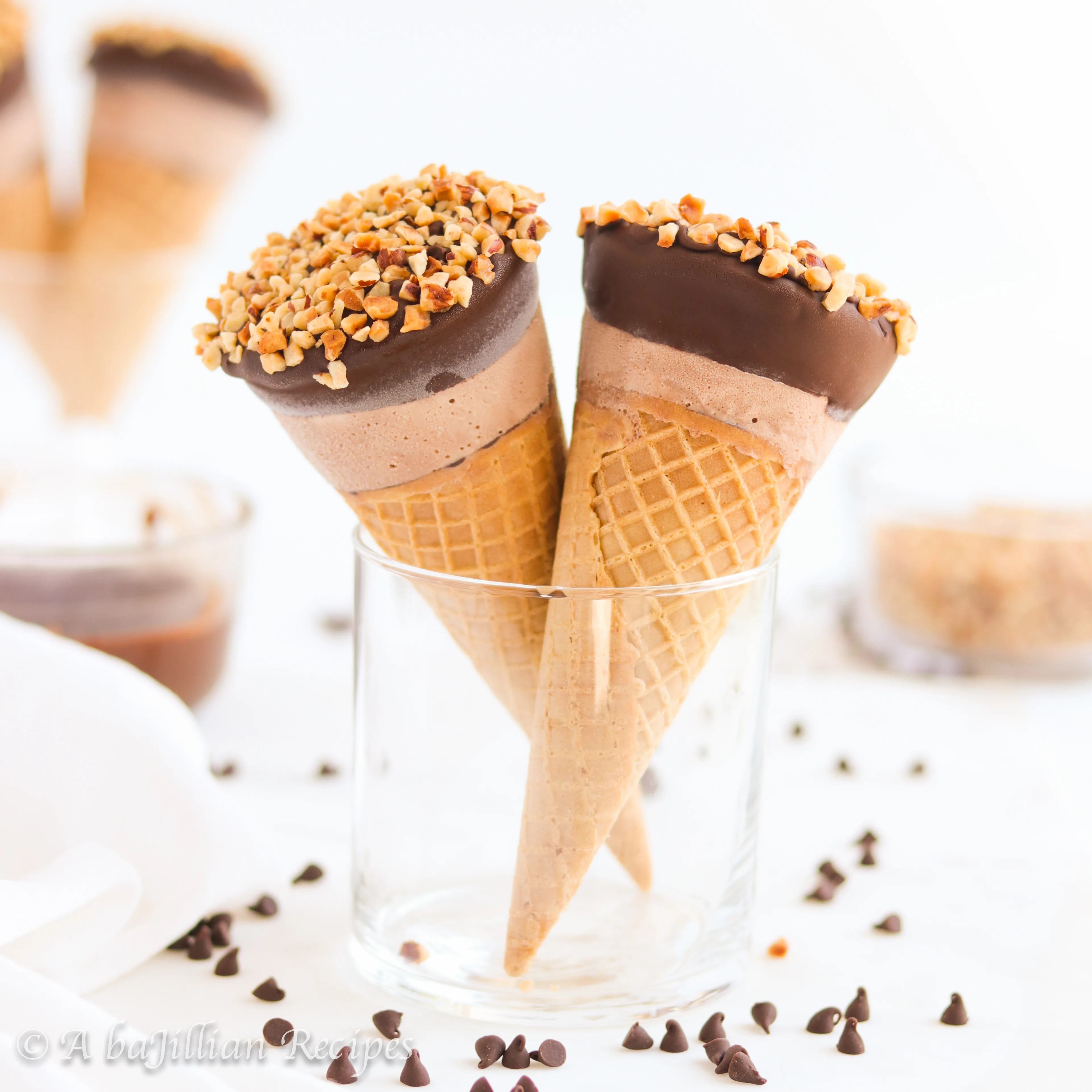 A crispy chocolate-coated sugar cone filled with the creamiest homemade Nutella ice cream, dipped in chocolate and toasted hazelnuts!