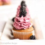 Perfectly moist and fluffy blackberry cupcakes topped with the silkiest melt-in-your-mouth blackberry Swiss meringue buttercream!