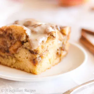 Supremely moist and fluffy cake loaded with tender cinnamon-spiced apples and swirls of buttery brown sugar filling, topped with delicious maple icing! 